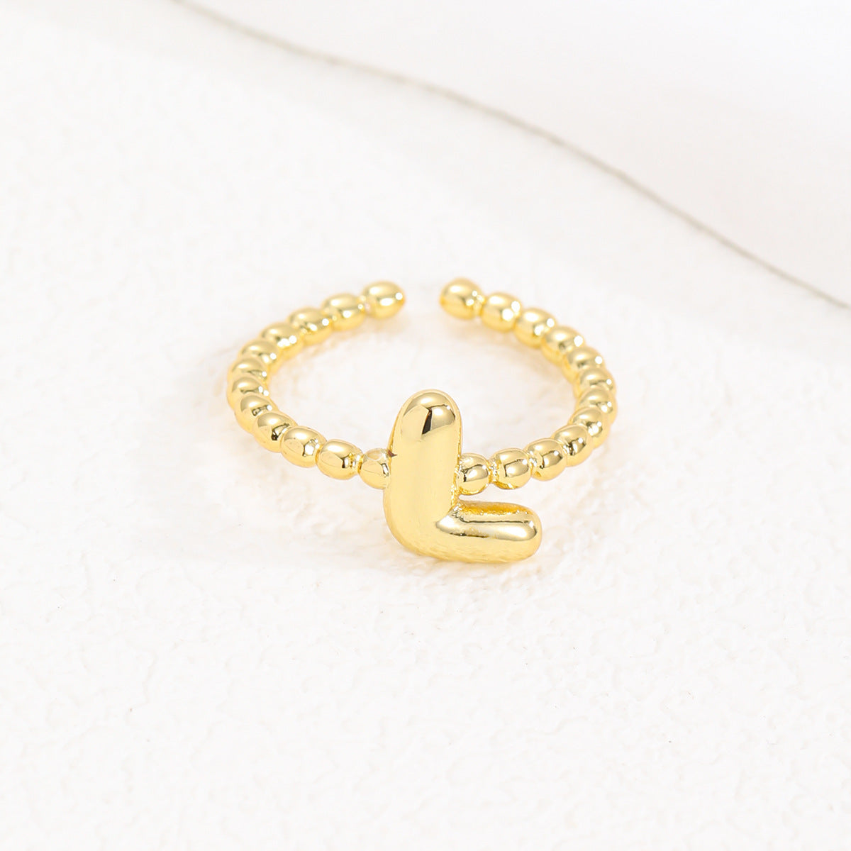 Statement Lady 18K Gold Glossy Brass Balloon Letter Ring